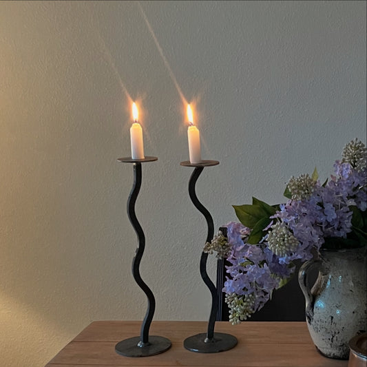 one of a kind pair of handcrafted iron candle holders